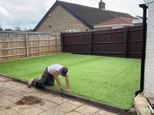 Installing Fake Grass In A Garden in Hertfordshire